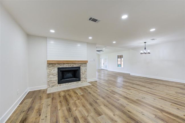 Breakfast Area has a fireplace | Image 7