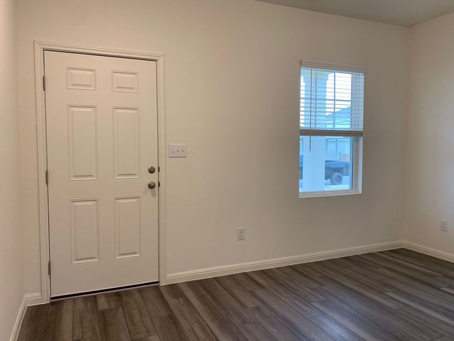 Unfurnished room with dark wood-type flooring | Image 9