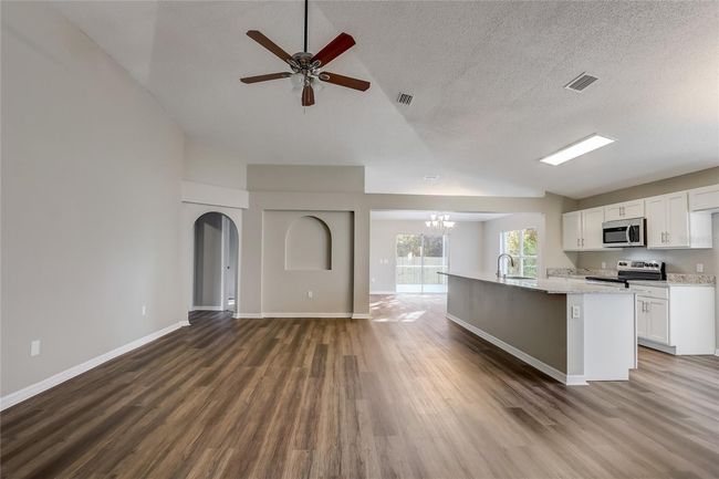 3843 Cinnamon Fern Loop, House other with 4 bedrooms, 2 bathrooms and null parking in CLERMONT FL | Image 4