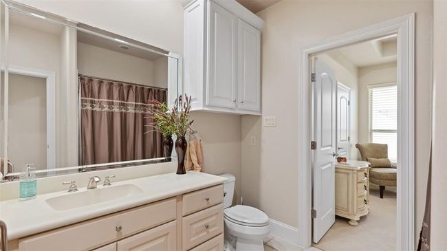 Guest bath with a shower and tub combination. | Image 41