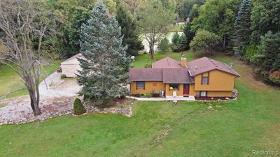 3121 Groveland Road, Home with 3 bedrooms, 2 bathrooms and null parking in Groveland Twp MI | Image 1