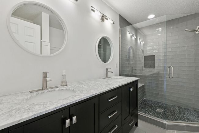 Update modern primary bath with double sinks and walk in shower | Image 16