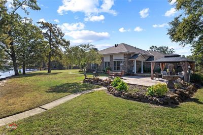 View of yard with a gazebo and a patio | Image 2