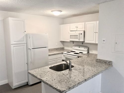 10104-651 Lyons Rd, Coconut Creek, FL, 33063-6717 | Card Image