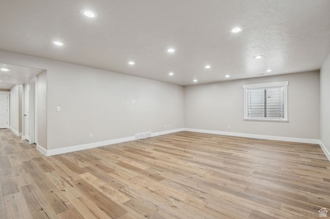 Empty room with light hardwood / wood-style flooring | Image 29