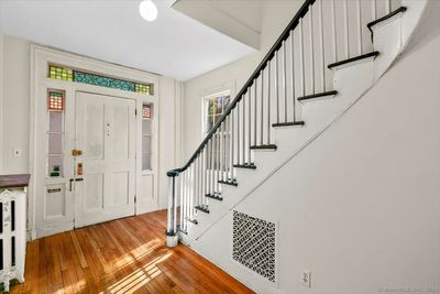 Beautiful Stain Glass accents the entry | Image 3