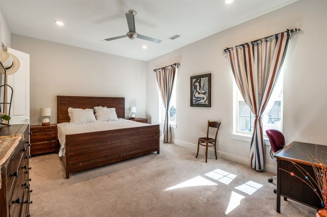 Primary bedroom is spacious with lots of natural light | Image 14