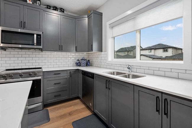 406 Hillcrest Road Sw, Home with 3 bedrooms, 3 bathrooms and 3 parking in Airdrie AB | Image 12