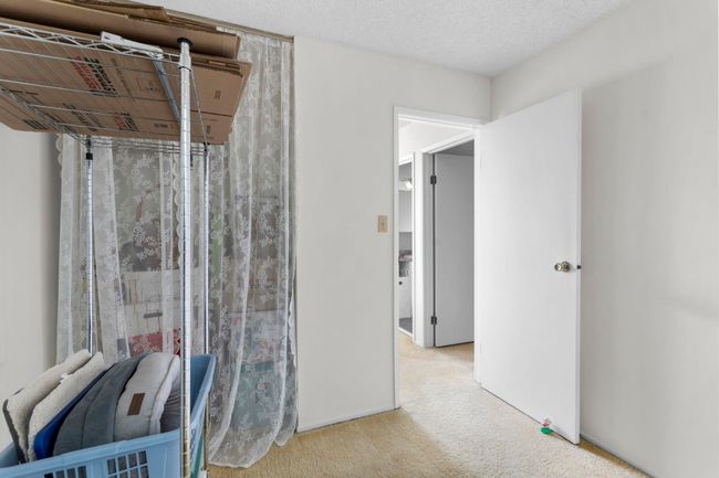 Hallway featuring carpet flooring | Image 28