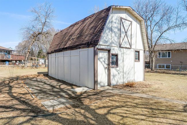 A large 27 x 16 storage shed provides space for outdoor equipment, tools, or a potential workshop space. | Image 19