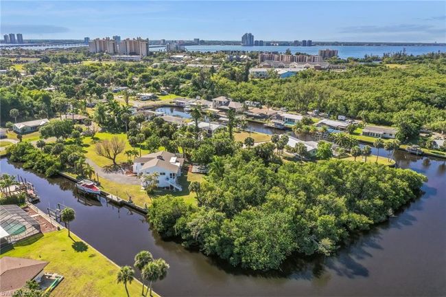 Aerial view featuring a water view and a city view | Image 31