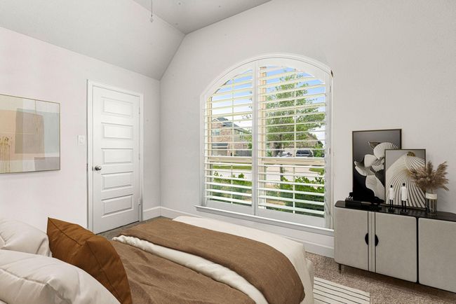 Secondary bedroom features plush carpet, neutral paint, ceiling fan with lighting and a large window with privacy blinds. *virtual staged* | Image 15