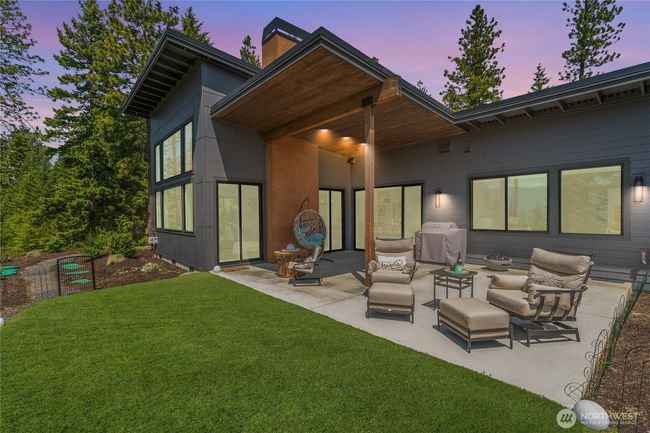 Whether you're enjoying morning coffee or evening gatherings, this peaceful space offers year-round comfort and unmatched mountain scenery | Image 33