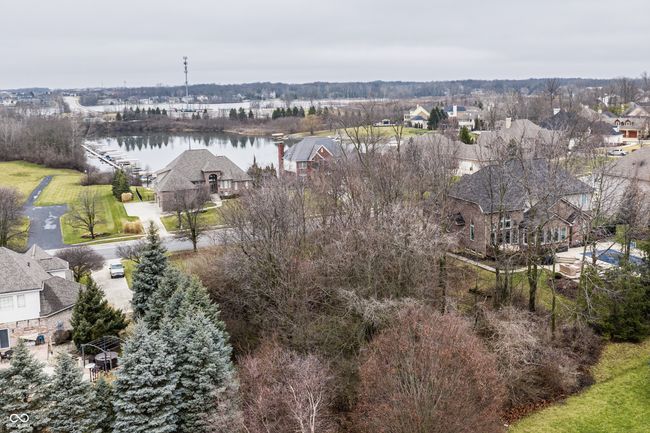 Birds eye view of property featuring a water view and a residential view. | Image 14