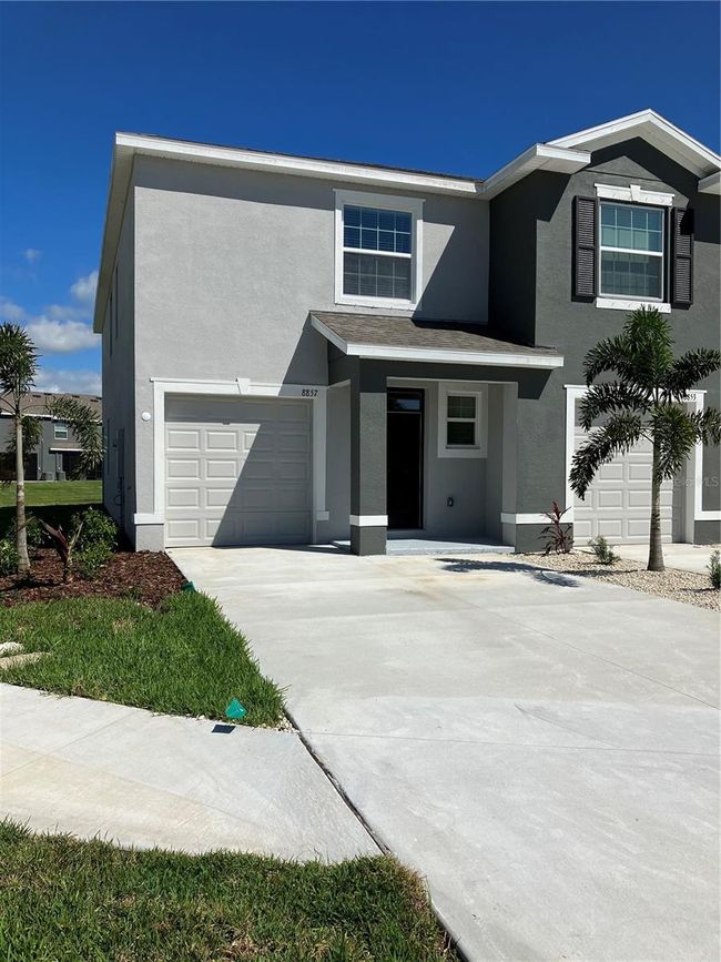 8857 Milestone Drive, Townhouse with 3 bedrooms, 2 bathrooms and null parking in SARASOTA FL | Image 1