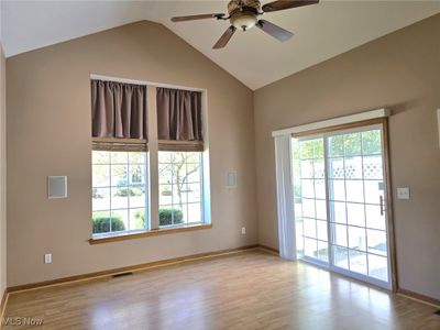 Windows in great room and glass doors to patio | Image 2