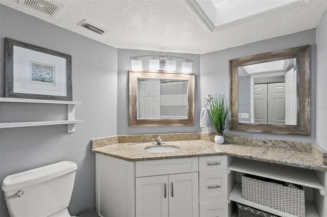 Main floor- guest bath. | Image 24