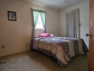 Master bedroom has a walk in closet and en-suite | Image 3