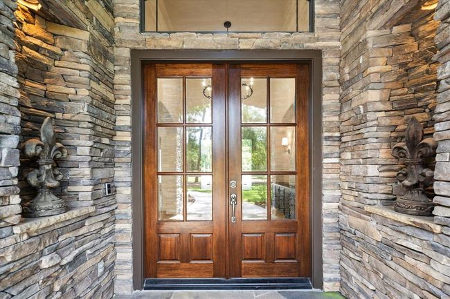 Custom Stacked Stone Art Niches Upon Entering This Custom Home | Image 5
