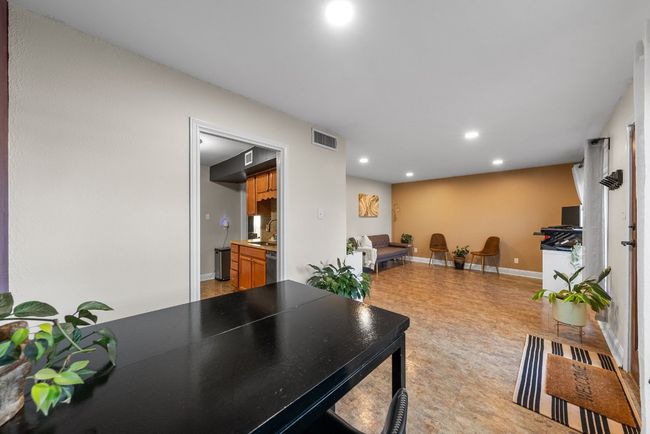 Breakfast Area and Den featuring an open space for a home office, library or family room | Image 12