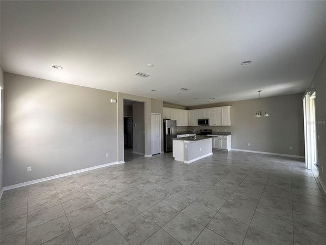 7309 Pool Compass Loop, House other with 4 bedrooms, 3 bathrooms and null parking in WESLEY CHAPEL FL | Image 5
