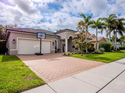 1550 Newhaven Point Lane, House other with 4 bedrooms, 3 bathrooms and null parking in West Palm Beach FL | Image 1