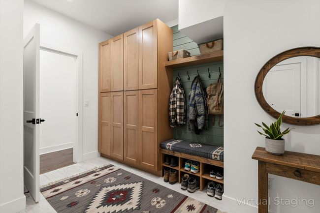 Mud Room adjacent to garage (virtually staged) | Image 25