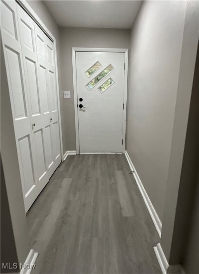 Doorway featuring hardwood / wood-style floors | Image 2