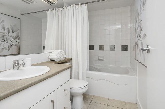 Bedroom with track lighting and access to exterior | Image 22