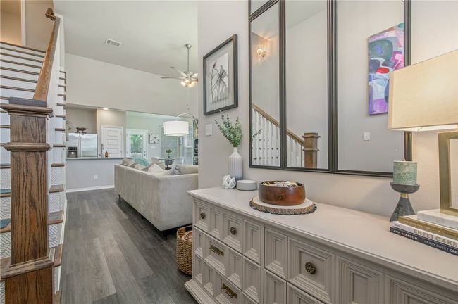 Full bathroom featuring wood finished floors, vanity, and ceiling fan | Image 6