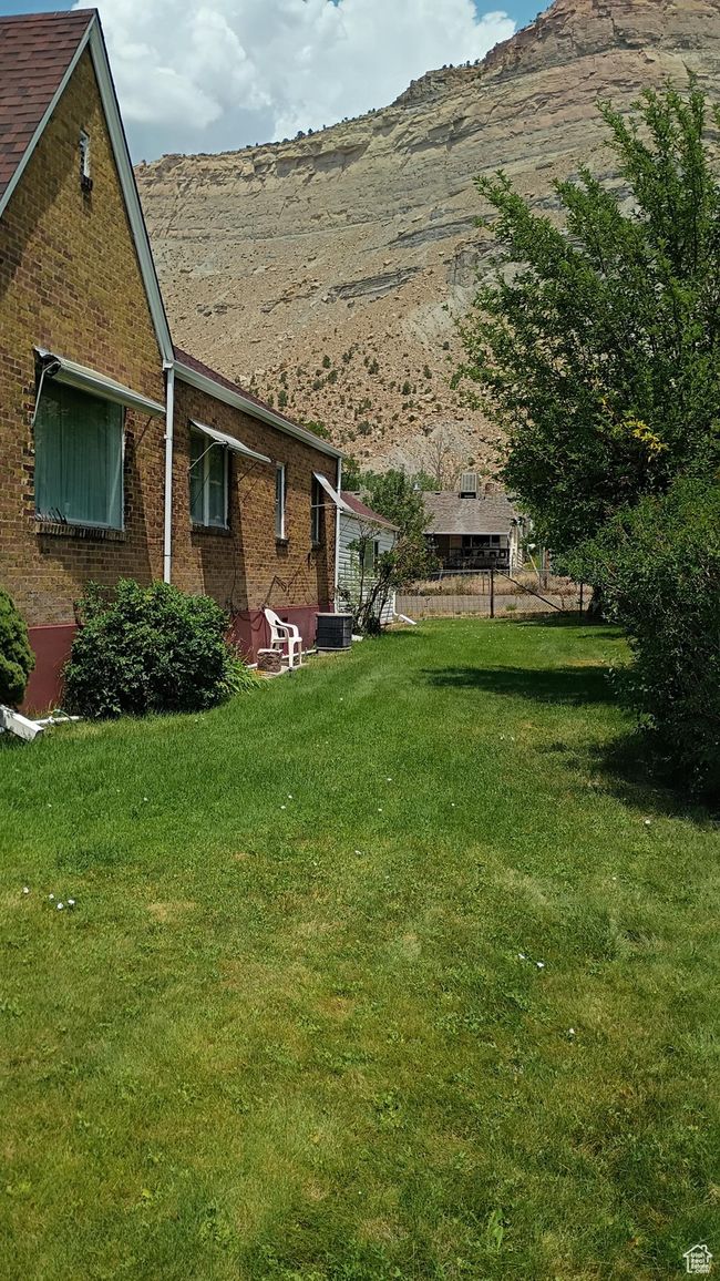 View of yard featuring a mountain view | Image 47