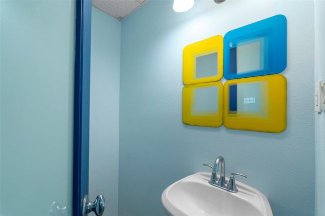 The first level powder bathroom. | Image 37
