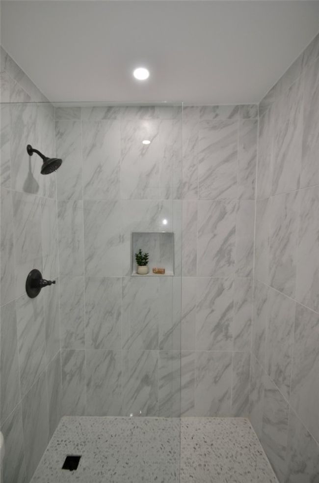 Bathroom with tiled shower and recessed lighting | Image 8