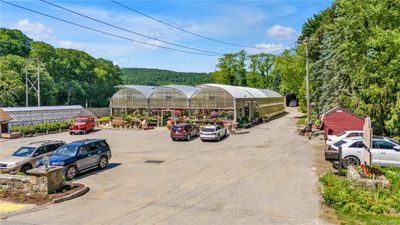 View of car parking featuring a carport | Image 3