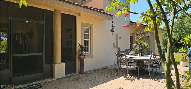 View of patio featuring outdoor dining space | Image 17