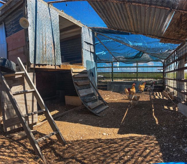 View of yard featuring an outdoor structure | Image 35