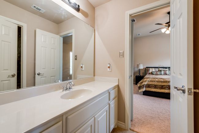 Bathroom featuring vanity, ensuite bathroom, and ceiling fan | Image 9