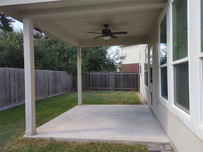 View of patio / terrace with a ceiling fan | Image 32