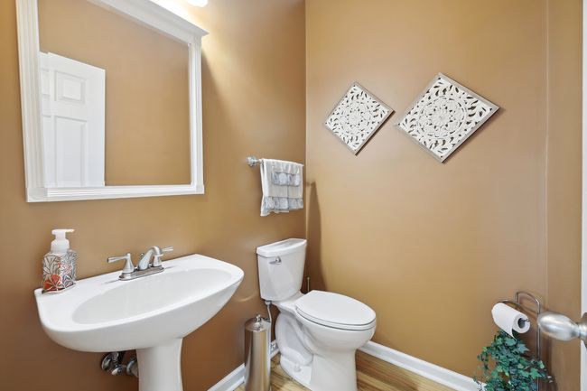 Large guest powder room in the hall. | Image 19