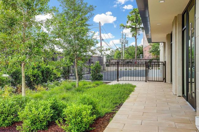 [Bespoke Landscaping and Dog Park] you and your pet can enjoy the convenience of a gated dog park (not picture) on the east side of the building, fully turfed | Image 38