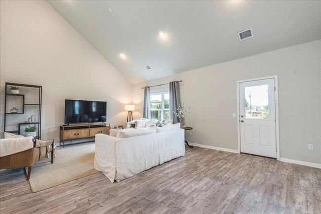 Large living room with soaring ceiling | Image 11