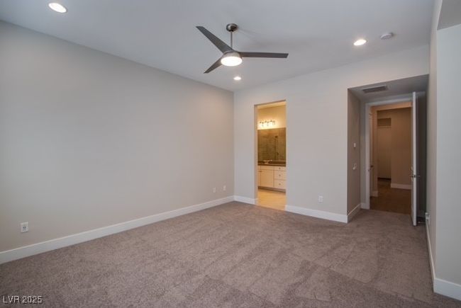 Unfurnished bedroom with baseboards, recessed lighting, and light carpet | Image 9