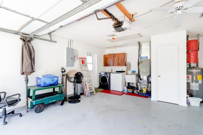 Water heat/softner, wash basin, W/D, closet, pull down attic stairs | Image 29