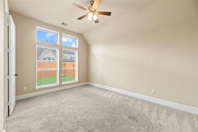 The largest of the 3 secondary bedrooms has it's own en-suite bath. Ideal for a guest suite. | Image 25