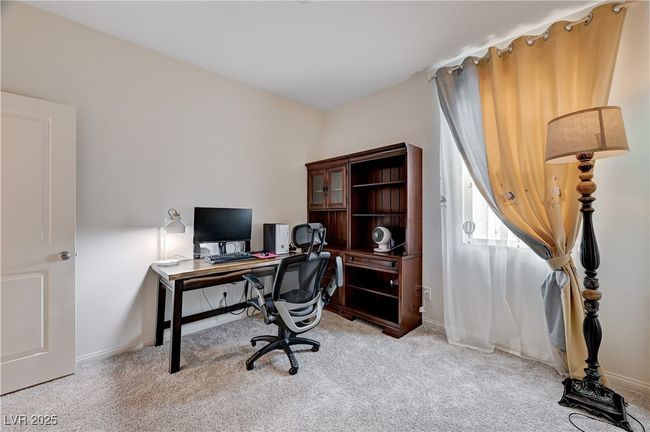 Office area with light colored carpet and baseboards | Image 28