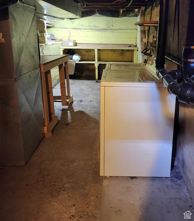 Unfinished basement with washer / clothes dryer and heating unit | Image 10