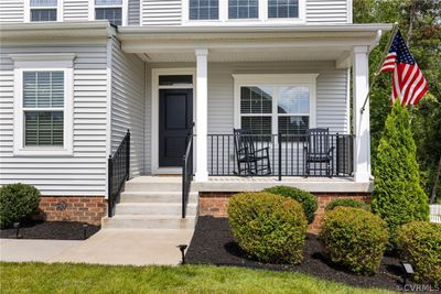 View of exterior entry with covered porch | Image 3