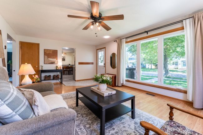 Bright and welcoming thanks to the expansive picture window. | Image 6