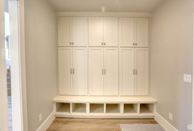 Mudroom with baseboards and light wood-style floors | Image 6