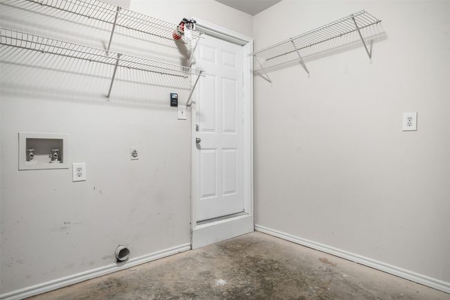 Laundry area featuring electric dryer hookup and washer hookup | Image 21